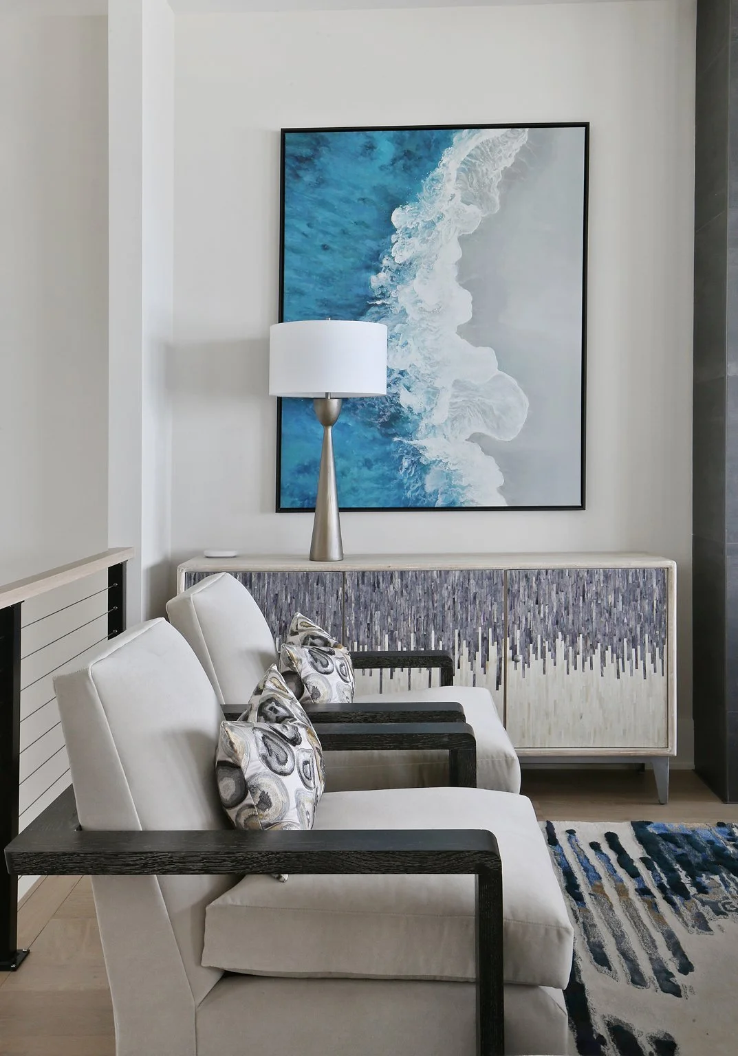 Custom joinery and a made-to-order furniture piece in a finished interior